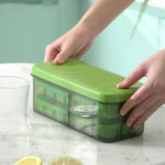 Silicone Ice Cube Tray with Lid And Storage Bin – Orange / Green - Image 6