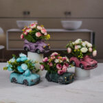 Artificial Flower Bonsai in Vintage Car Cement Planter