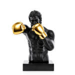 BLACK AND GOLD POLYRESIN SCULPTURE