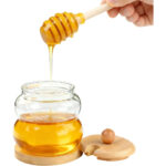Glass Honey Dispenser with Wooden Lid, Dipper and Base - Image 2