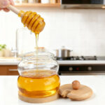 Glass Honey Dispenser with Wooden Lid, Dipper and Base - Image 5